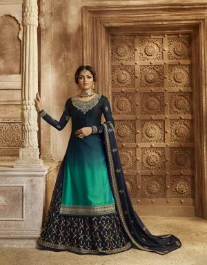 Shaded Dress Can Never Goes Out Of Style. So Grab This Designer Two In One Indo-Western Suit In Navy Blue And Blue Shaded Top Paired With Navy Blue Colored Bottom, Lehenga And Dupatta. Its Top Is Fabricated On Satin Georgette Paired With Santoon Bottom And Georgette Fabricated Lehenga And Dupatta. Buy This Now.
