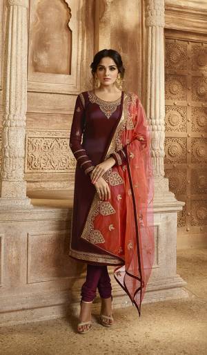 Celebrate This Festive And Wedding Season with Beauty And Comfort Wearing This Designer Indo-Western Suit In  Maroon Colored Top And Bottom Paired With Contrasting Orange Colored Bottom And Dupatta. Its Pretty Embroidered Top IS Satin Georgette Based Paired With Santoon Bottom And Georgette Fabricated Lehenga And Dupatta. 