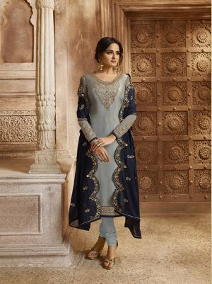Look Pretty In This Lovely Designer Piece Which You can Wear In Two Ways As It Comes With A Bottom And Lehenga. Its Top And Bottom Are In Steel Blue Color Paired With Navy Blue Colored Lehenga And Dupatta. Its Top Is Fabricated On Satin Georgette Paired With Santoon Bottom And Georgette Fabricated Lehenga And Dupatta. Buy This Semi-Stitched Suit Now.