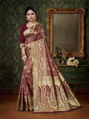 Adorn The Pretty Angelic Look  In This Designer Silk Based Saree In Maroon Color. This Saree And Blouse are Fabricated On Art Silk Beautified With Heavy Weave. Buy Now.