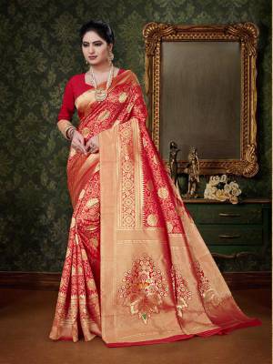 Celebrate This Festive Season With A Pure Traditional Touch Wearing This Designer Silk Based Saree In Red Color. This Saree And Blouse Are Fabricated On Art Silk Beautified With Weave All Over. Buy This Designer Saree Now.