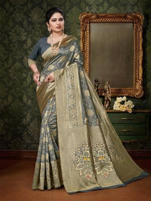 Adorn The Pretty Angelic Look  In This Designer Silk Based Saree In Grey Color. This Saree And Blouse are Fabricated On Art Silk Beautified With Heavy Weave. Buy Now.