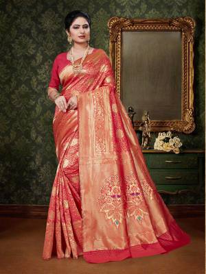 Celebrate This Festive Season With A Pure Traditional Touch Wearing This Designer Silk Based Saree In Red Color. This Saree And Blouse Are Fabricated On Art Silk Beautified With Weave All Over. Buy This Designer Saree Now.