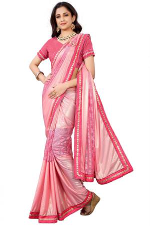 Here Is A Very Pretty Girly Look With This Designer Saree In Pink Color Paired With Pink Colored Blouse. This Saree Is Fabricated On Lycra Paired With Art Silk Fabricated Blouse. It Is Beautified With Lace Border And Patch Work. 