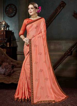 You Will Definitely Earn Lots Of Compliments Wearing This Designer Saree In Peach Color Paired With Peach Colored Blouse. This Saree Is Fabricated On Georgette Paired With Art Silk Fabricated Blouse .