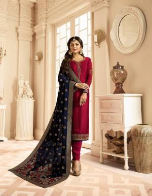 Catch All The Limelight Wearing This Designer Straight Suit In Dark Pink Color Paired With Contrasting Navy Blue Colored Dupatta. Its Pretty Embroidered Top Is Fabricated On Satin Georgette Paired With Santoon Bottom And Jacquard Silk Fabricated Dupatta. Buy Now.