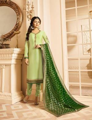 Summers Is About Subtle Shades And Pastel Play, So Grab This Designer Straight Suit In Pastel Green Colored Top And Bottom Paired With Green Colored Dupatta. Its Top Is Fabricated On Satin Georgette Paired With Santoon Bottom And Jacquard Silk Fabricated Weaved Dupatta. 