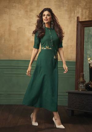 Pretty Formal Look Is Here With This Designer Readymade Kurti In Pine Green Color Fabricated On Satin Cotton. It Is Beautified With Thread Work And Also Available In All Regular Sizes. 