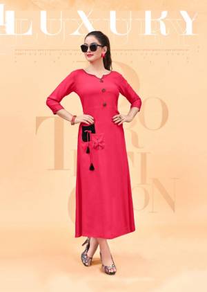Shine Bright Wearing This Designer Reeadymade Kurti In Dark Pink Color Fabricated On Rayon. This Pretty Kurti Can Be Paired With Same Or Black Colored Leggings Or Pants. Its Fabric Also Ensures Superb Comfort All Day Long. 