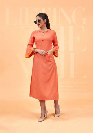 Add This Beautiful Designer Readymade Kurti To Your Wardrobe In Orange Color Fabricated On Rayon. This Straight Kurti With High Neck Pattern Gives A Rich Look To Your Personality. Buy Now.