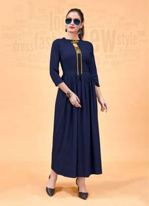 You Will Definitely Earn Lots Of Compliments Wearing This Designer Readymade Kurti In Navy Blue Color. Its Lovely Pattern And Elegant Design Will Give A Unique Look To Your Personality. Buy This Readymade Kurti Now.