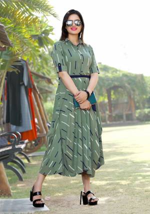 Formal Looking Designer Readymade Kurti Is Here In Olive Green Color Fabricated On Rayon. Its Rich Color And Decent Pattern Will Earn You Lots Of Compliments From Onlookers. 