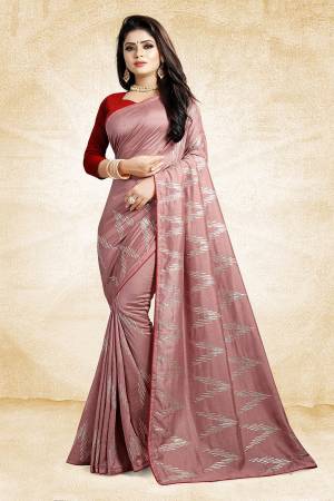 Look Pretty In This Rich And Elegant Looking Designer Saree In Onion Pink Color Paired With Contrasting Red Colored Blouse. This Saree And Blouse Are Silk Based Beautified With Attractive Embroidery. Also It Is Light In Weight And Easy To Carry All Day Long. 