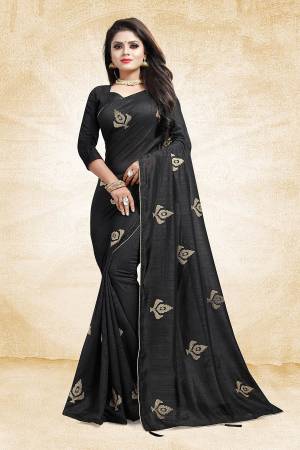 For A Bold And Beautiful Look This Festive Season, Grab This Designer Saree In Black Color Paired With Black Colored Blouse. This Saree And Blouse Are Silk Based Beautified With Embroidered Butti All over The Saree. Buy This Saree Now.