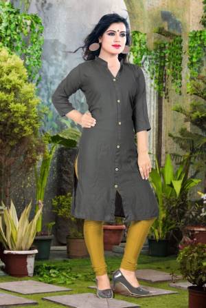 Add Some Casuals With This Plain Readymade Kurti In Dark Grey Color Fabricated On Cotton. This Kurti Is Light Weight, Soft Towards Skin, Durable And Also Available In All Regular Sizes, Buy This Simple Kurti Now.