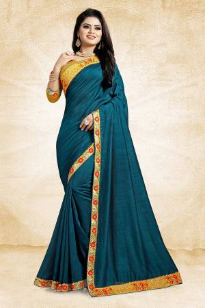 Celebrate The Festive Season With Beauty And Comfort Wearing This Designer Silk Based Saree In Blue Color Paired With Contrasting Musturd Yellow Colored Blouse. It Is Beautified With Contrasting Thread And Jari Work Over The Blouse And Saree Lace Border. Buy This Designer Saree Now.