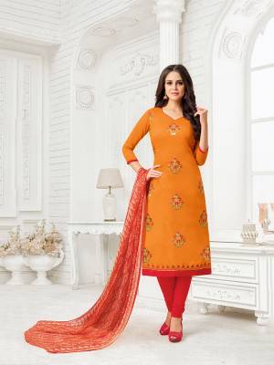 Here Is A Proper Traditional Color Pallete With This Designer Dress Material In Orange Colored Top Paired With Contrasting Red Colored Bottom And Red And Orange Colored  Dupatta. Its Top Is Fabricated On Modal Silk Paired With Cotton Bottom And Chiffon Printed Dupatta. 