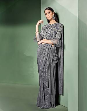 Mindblowing mettalic details and delicate drapes makes this saree a perfect pick for a cocktail night. Go soft with the makeup and sharp with your hairdo to look sensational. 