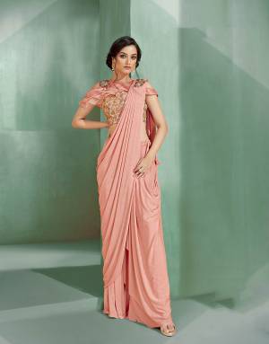 Get two-looks  - the modern outlook of palazzo and ethnic style of saree in one and rock your ethnic tastes like no other. Keep the makeup fresh and dewy to look young .