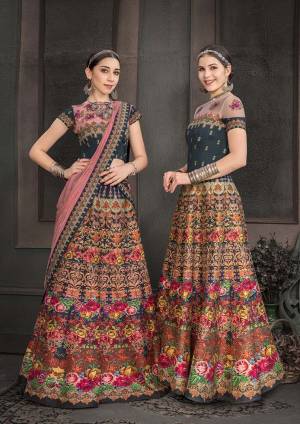 Look Beautiful In This Designer Colorful Two In One Lehenga Choli Dress. This Multi Colored Lehenga Choli Is Fabricated On Heritage Art Silk Beautified With Digital Prints And Stone Work All Over. You Can Get This Stitched As A Floor Length Suit Or Lehenga As Per Your Comfort And Occasion. 