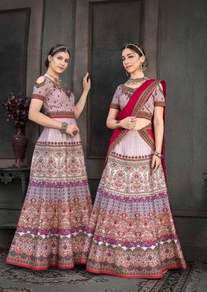 Go Colorful With This Designer Two In One Lehenga Which You Make It As Floor Length Suit Or Lehenga. Its Pretty Blouse And Lehenga are Fabricated On Heritage Art Silk Paired With Chiffon Fabricated Dupatta. It Is Beautified With Digital Prints And Stone Work. Buy This Designer Piece Now.