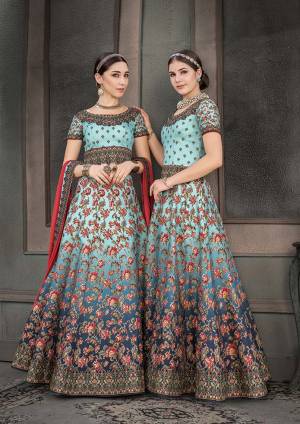 Look Beautiful In This Designer Colorful Two In One Lehenga Choli Dress. This Multi Colored Lehenga Choli Is Fabricated On Heritage Art Silk Beautified With Digital Prints And Stone Work All Over. You Can Get This Stitched As A Floor Length Suit Or Lehenga As Per Your Comfort And Occasion. 