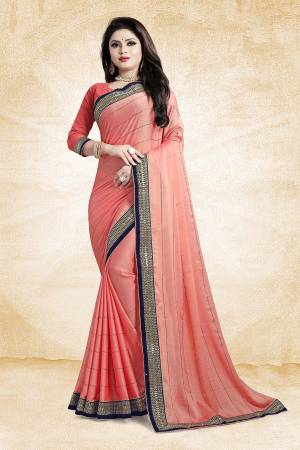 Get Ready For The Upcoming Wedding Season In The Most Elegant Style Wearing This Designer Saree In Dark Pink Color Paired With Dark Pink Colored Blouse. This Saree Is Fabricated On Satin Georgette Paired With Art Silk Fabricated Blouse. Its Is Beautified With Heavy Embroidered Lace Border And Stone Work Over The Saree.