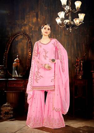 Catch All The Limelight At The Next Wedding You Attend Wearing This Designer Sharara Suit In Powder Pink Color. This Pretty Suit All Over Is Fabricated On Georgette Beautified With Attractive Embroidery. It Is Light In Weight And Easy To Carry Throughout The Gala.