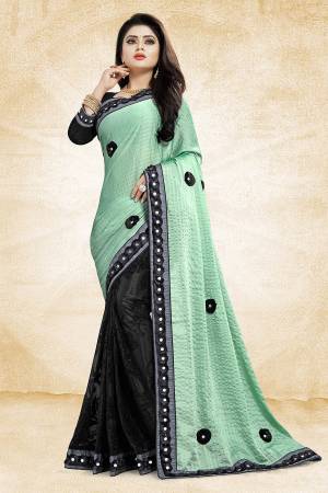 Bold And Elegant Looking Designer Saree Is Here In Light Green And Black Color Paired With Black Colored Blouse. This Saree Is Fancy Fabric Based Paired With Art Silk Fabricated Blouse. It Is Beautified With 3D Work And Lace Border. Buy Now.