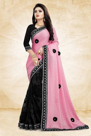 Bold And Elegant Looking Designer Saree Is Here In Pink And Black Color Paired With Black Colored Blouse. This Saree Is Fancy Fabric Based Paired With Art Silk Fabricated Blouse. It Is Beautified With 3D Work And Lace Border. Buy Now.