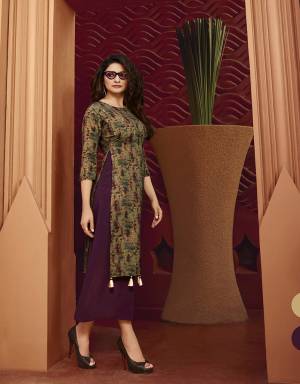 You Will Definitely Earn Lots Of Compliments Wearing This Designer Double Layered Readymade Kurti In Wine And Olive Green Color Fabricated On Art Silk And Satin Beautified With Prints And Stone Work. 