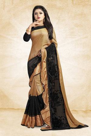 Adopt The Fashion Trend In Your Style With This Designer Frill Saree In Beige And Black Color Paired With Black Colored Blouse, This Saree Is Fabricated On Soft Silk Paired With Art Silk Fabricated Blouse. It Is Beautified with Fancy Lace Border And Frill. Buy This Saree Now.