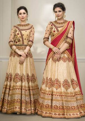 Grab This Beautiful Designer Two In One Lehenga Choli Cum Gown In Beige Color. You Can Get This Stitched As A Lehenga Or Floor Length Gown As Per Your Occasion And Convenience. Its Blouse Are Lehenga Are Fabricated On Banarasi Art Silk Beautified With Digital Prints And Embroidery Paired With Chiffon Fabricated Dupatta. Buy This Heavy Designer Piece Now. 