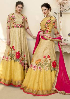 Grab This Beautiful Designer Two In One Lehenga Choli Cum Gown In Yellow Color. You Can Get This Stitched As A Lehenga Or Floor Length Gown As Per Your Occasion And Convenience. Its Blouse Are Lehenga Are Fabricated On Banarasi Art Silk Beautified With Digital Prints And Embroidery Paired With Chiffon Fabricated Dupatta. Buy This Heavy Designer Piece Now. 