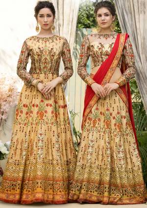 Grab This Beautiful Designer Two In One Lehenga Choli Cum Gown In Beige Color. You Can Get This Stitched As A Lehenga Or Floor Length Gown As Per Your Occasion And Convenience. Its Blouse Are Lehenga Are Fabricated On Banarasi Art Silk Beautified With Digital Prints And Embroidery Paired With Chiffon Fabricated Dupatta. Buy This Heavy Designer Piece Now. 