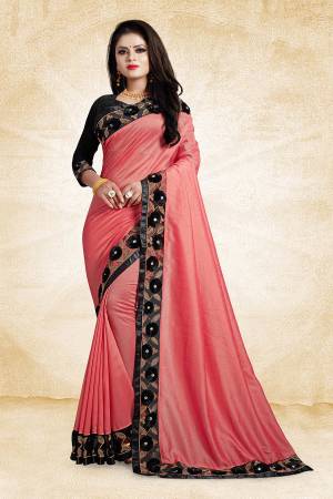 Look Pretty In This Designer Silk Based Saree In Pink Color Paired With Black Colored Blouse. This Saree And Blouse Are Silk Based Beautified With Embroidered Lace Border With 3D Work. 