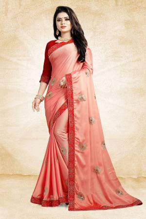 Celebrate This Festive Season With Beauty And Comfort Wearing This Designer Saree In Dark Peach Color Paired With Contrasting Red Colored Blouse. This Saree Is Fabricated On Satin Georgette Paired With Art Silk Fabricated Blouse. It Is Beautified With Embroidered Butti All Over.