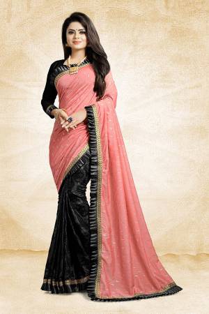 Here Is A Beautiful Designer Saree For The Next Party You Attend. Grab This Designer Saree In Pink And Black Color Paired With Black Colored Blouse, This Saree Is Fabricated On Linen And Fancy Fabric Paired With Art Silk Fabricated Blouse. It Has Pretty Fancy Work And Frill Lace Border. 