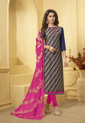 Celebrate This Festive Season With Beauty And Comfort Wearing This Suit In Navy Blue Colored Top Paired With Contrasting Fuschia Pink Colored Bottom And Dupatta. Its Top Is Fabricated On Jacquard Silk Paired With Cotton Bottom And Chiffon Fabricated Dupatta. Grab This Dress Material Now.