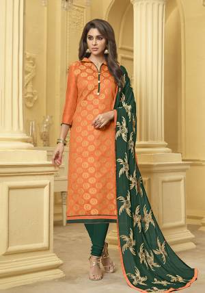 Grab This Pretty Dress Material And Get This Stitched As Per Your Desired Fit And Comfort. Its Top Is Fabricated On Jacquard Silk Paired With Cotton Bottom And Chiffon Fabricated Dupatta. This Pretty Orange And Dark Green Color Pallete Earn You Lots of Compliments From Onlookers. 