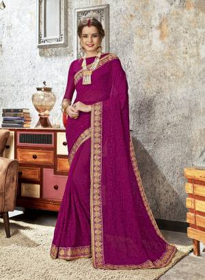 Grab This Beautiful Designer Saree For The Upcoming Festive And Wedding Season In This Designer Magenta Pink Colored Saree Paired With Magenta Pink Colored Blouse. This Heavy Embroidered Saree Is Fabricated On Chiffon Paired With Art Silk Fabricated Blouse. Its Pretty Tone To Tone Embroidery Gives A Rich And Subtle Look To Your Personality. 