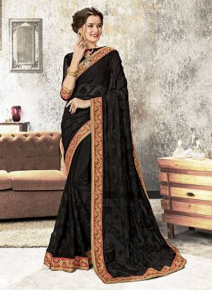 For A Bold And Beautiful Look, Grab This Heavy Designer Saree In Black Color Paired With Black Colored Blouse. This Saree Is Chiffon Based Beautified With Tone To Tone Embroidery Paired With Art Silk Fabricated Blouse. 