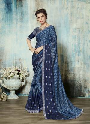 Grab This Pretty Saree For Your Semi-Casual Wear In Blue Color Paired Blue Colored Blouse. This Saree IS Georgette Based Paired With Art Silk Fabricated Blouse. Buy Now.