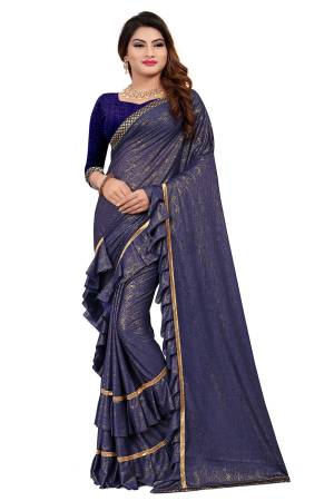 Get Ready For The Upcoming Party At Your place With This Designer Saree In Navy Blue Color Paired With Navy Blue Colored Blouse. This Saree Is Fabricated On Lycra Paired With Art Silk Fabricated Blouse. It Has Pretty Two Layer Frill With Lace Border. Buy This Designer Piece Now. 