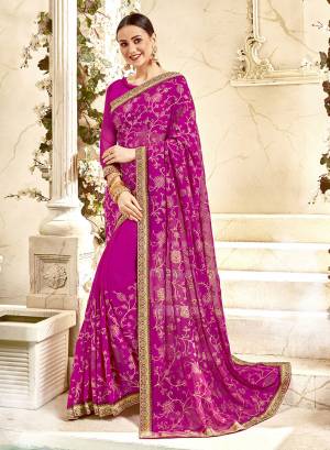 Bright And Visually Appealing Color IS Here With This Heavy Designer Saree In Rani Pink Color Paired With Rani Pink Colored Blouse. This Saree And Blouse Are Georgette Based Beautified With Heavy Embroidery All Over. 