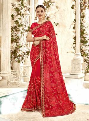 Adorn The Pretty Angelic Look In This Heavy Designer Red Colored Saree Paired With Red Colored Blouse. This Saree And Blouse are Georgette Based Beautified With Heavy Embroidery. 