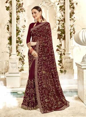 Bright And Visually Appealing Color IS Here With This Heavy Designer Saree In Brown Color Paired With Brown Colored Blouse. This Saree And Blouse Are Georgette Based Beautified With Heavy Embroidery All Over. 