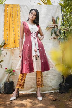 Beat The Heat This Summer Wearing This Designer Readymade Indo Western Pair Of Kurti And pants. This Whole Set Is Khadi Based Beautified With Prints And Thread Embroidery. It Is Available In Sizes, Choose As Per Your Desired Fit And Comfort. 