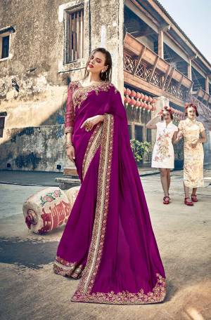 Celebrate This Festive Season With Beauty And Comfort Wearing This Designer Saree In Magenta Pink Color Paired With Magenta Pink Colored Blouse. This Saree Is Fabricated On Satin Silk Paired With Art Silk Fabricated Blouse. 