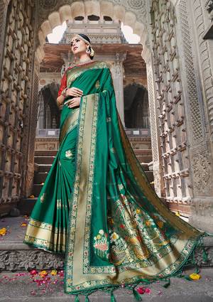 You Will Definitely Earn Lots Of Compliments In This Rich And Elegant Silk Based Saree, This Banarasi Art Silk Fabricated Saree And Blouse are Beautified With Weave Giving It An Attractive Look